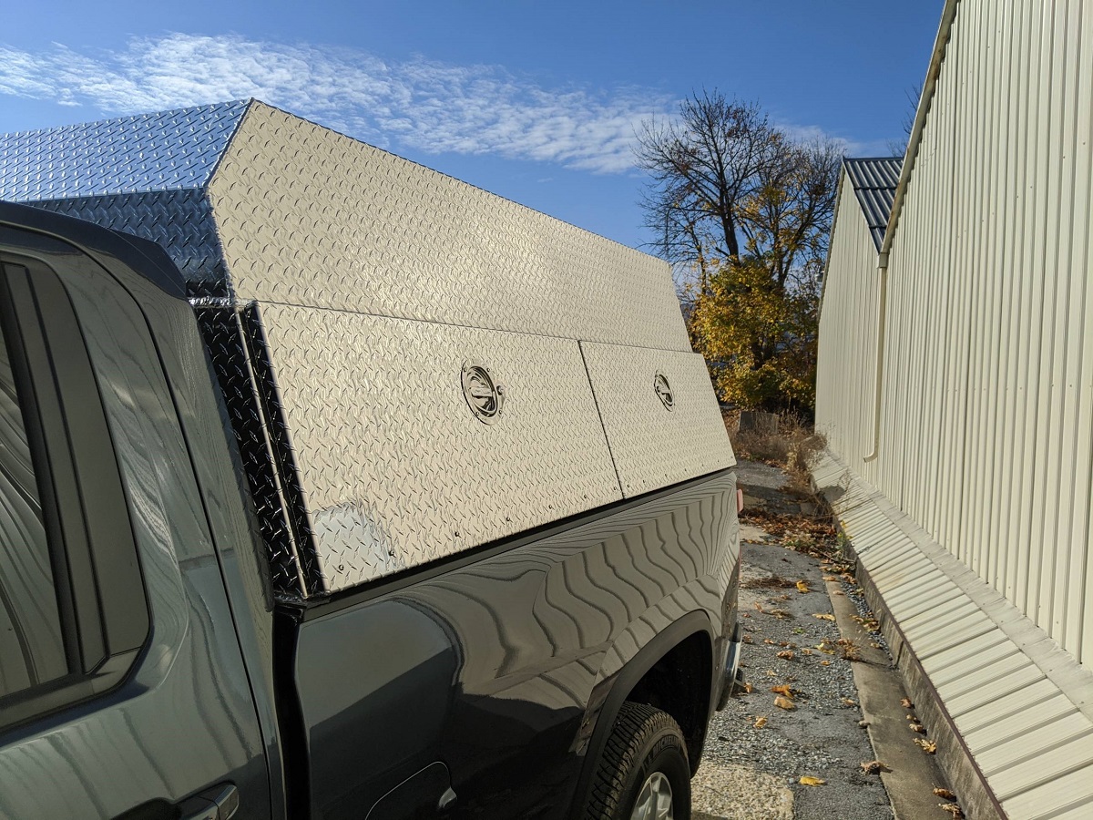 cap with custom side rail truck tool boxes