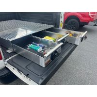 Low-profile truck bed toolbox